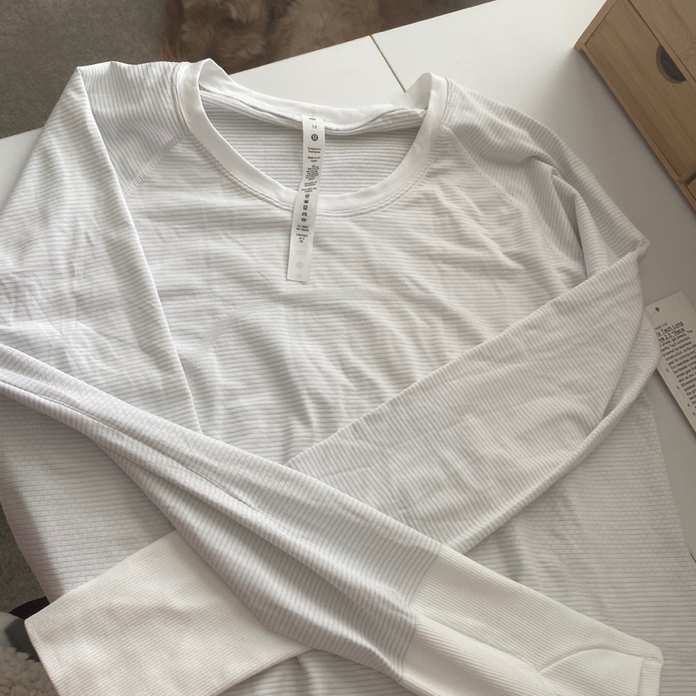 Brand new white swiftly tech long sleeve from Lululemon